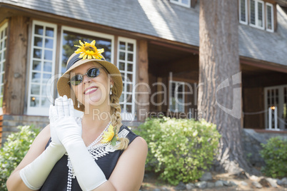 Attractive Woman in Twenties Outfit Near Antique House