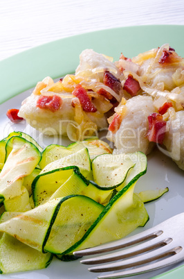 Silesian dumplings with Bacon and zucchini