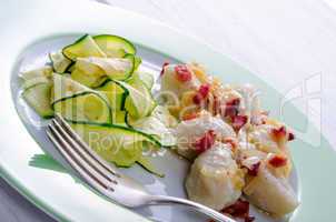 Silesian dumplings with Bacon and zucchini