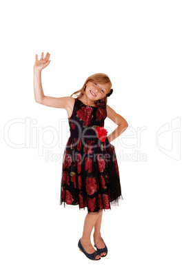 Girl waiving with her hand.