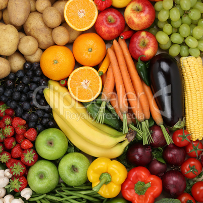 Obst, Früchte und Gemüse wie Orangen, Tomaten und Apfel Hinter