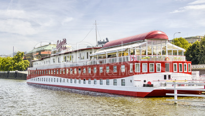 BRATISLAVA, SLOVAKIA - JUNE 24, 2011: Red cruise ship anchored o