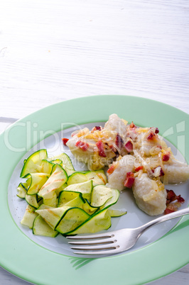 Silesian dumplings with Bacon and zucchini