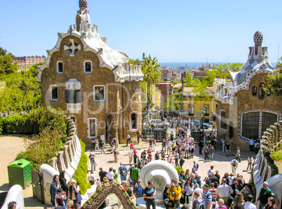 BARCELONA - MAY 25, 2005: Tourists enjoy Park Guell. Designed by