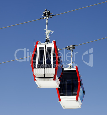 Two gondola lifts close-up view