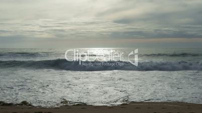 Waves Crashing on Beach, sunset