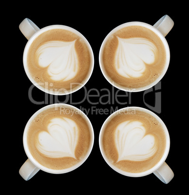 Cup of art cappuccino coffee heart symbol