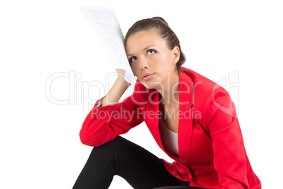 Sitting businesswoman looking up