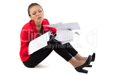 Businesswoman with a pile of papers