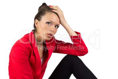 Thinking businesswoman looking at camera