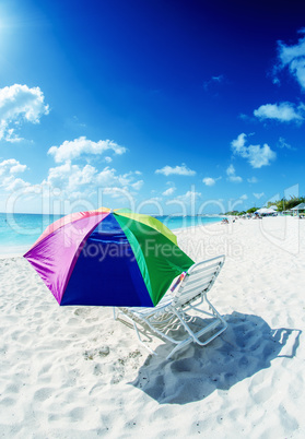 Colourful umbrella on a beautiful beach