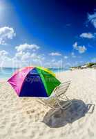 Colourful umbrella on a beautiful beach