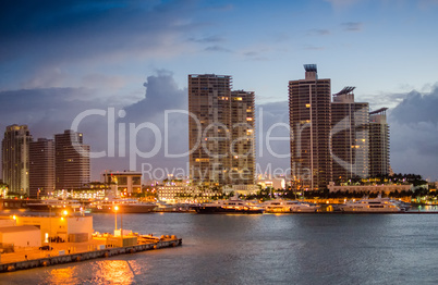 Miami skyscrapers and skyline at sunrise. Beautiful colors of na