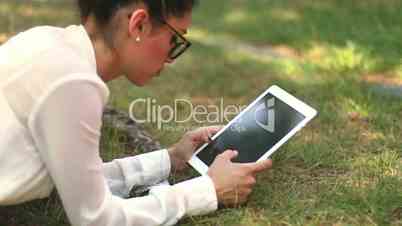 Girl with Tablet in the Park Leisure Time