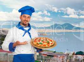 Young chef with neapolitan pizza margherita