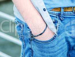 Boy with hand in jeans pocket