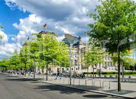 BERLIN - MAY 27, 2012: Tourists walk along Reichstag area. More