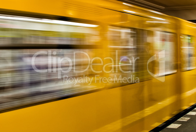 BERLIN - MAY 24, 2012: U-bahn train speeds up in subway station.