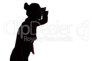 Silhouette of leaned forward woman
