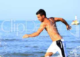 Man run at the beach