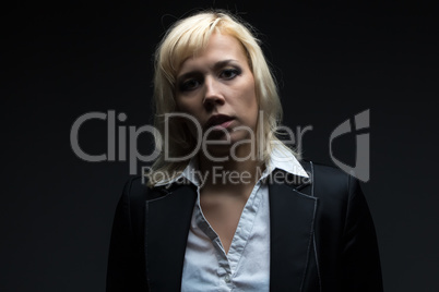 Serious businesswoman looking at camera