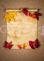 Old paper with autumn leaves
