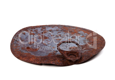 Old rusty cap of tin can isolated on white backgroun