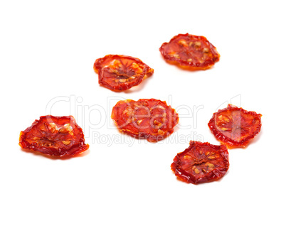 Dried tomatoes on white background