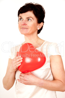 Woman holding red heart