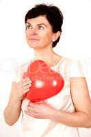 Woman holding red heart