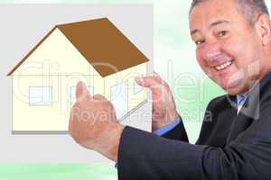 Man holding and pointing at sign with house