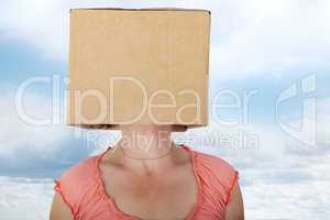 Woman has box with painted face on the head