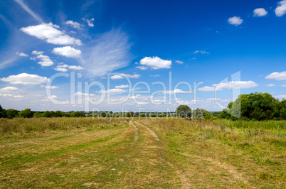 Landscape with dirt road in the countryside
