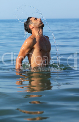 man coming out of the water