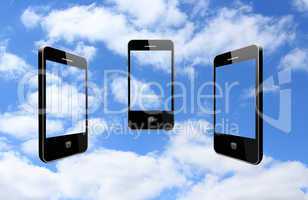 three modern mobile phones on the sky