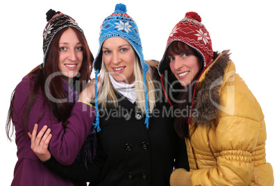 Gruppe von jungen Frauen im Winter mit Mütze und Handschuhen di