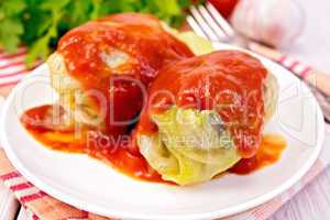 Cabbage stuffed with tomato sauce on plate
