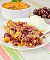 Crumble cherry with berries on plate