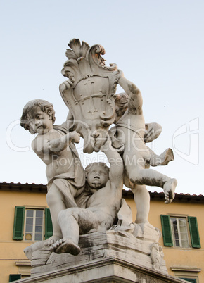 Cherub statue that sits on the Field of Miracles - Pisa, Italy