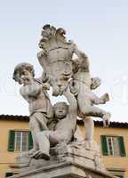 Cherub statue that sits on the Field of Miracles - Pisa, Italy