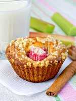 Cupcake with rhubarb and milk on napkin