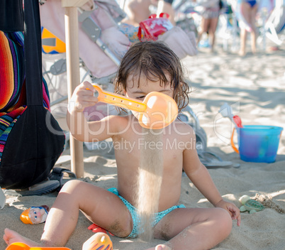 Baby enjoying beach life