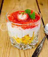 Dessert milk with strawberry and flakes in glass