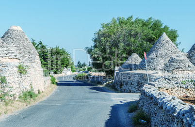 Apulia, Italy. Unique Trulli houses with conical roofs in Albero