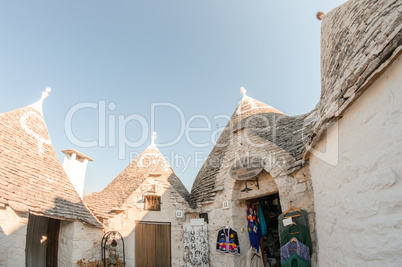 ALBEROBELLO, PUGLIA, ITALY - AUG 23: Tourists stroll among Trull