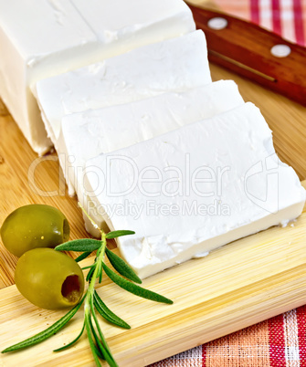 Feta with olives on a red fabric