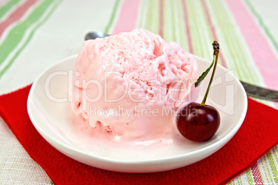 Ice cream cherry on red paper napkin