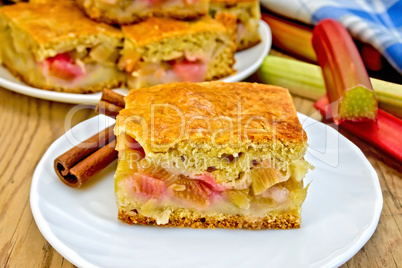 Pie rhubarb in plate on board