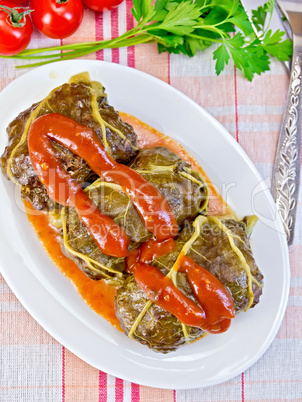 Rhubarb leaves stuffed in bowl with sauce