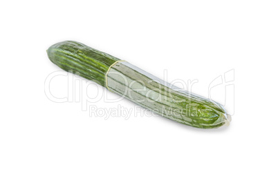 cucumber with condom on white